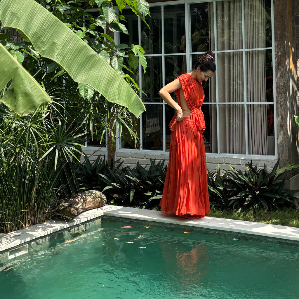 Pure silk chiffon skirt handmade in small artisan batches in India. The Agni skirt features a flowing silhouette, cotton lining, and refined slow-fashion elegance.